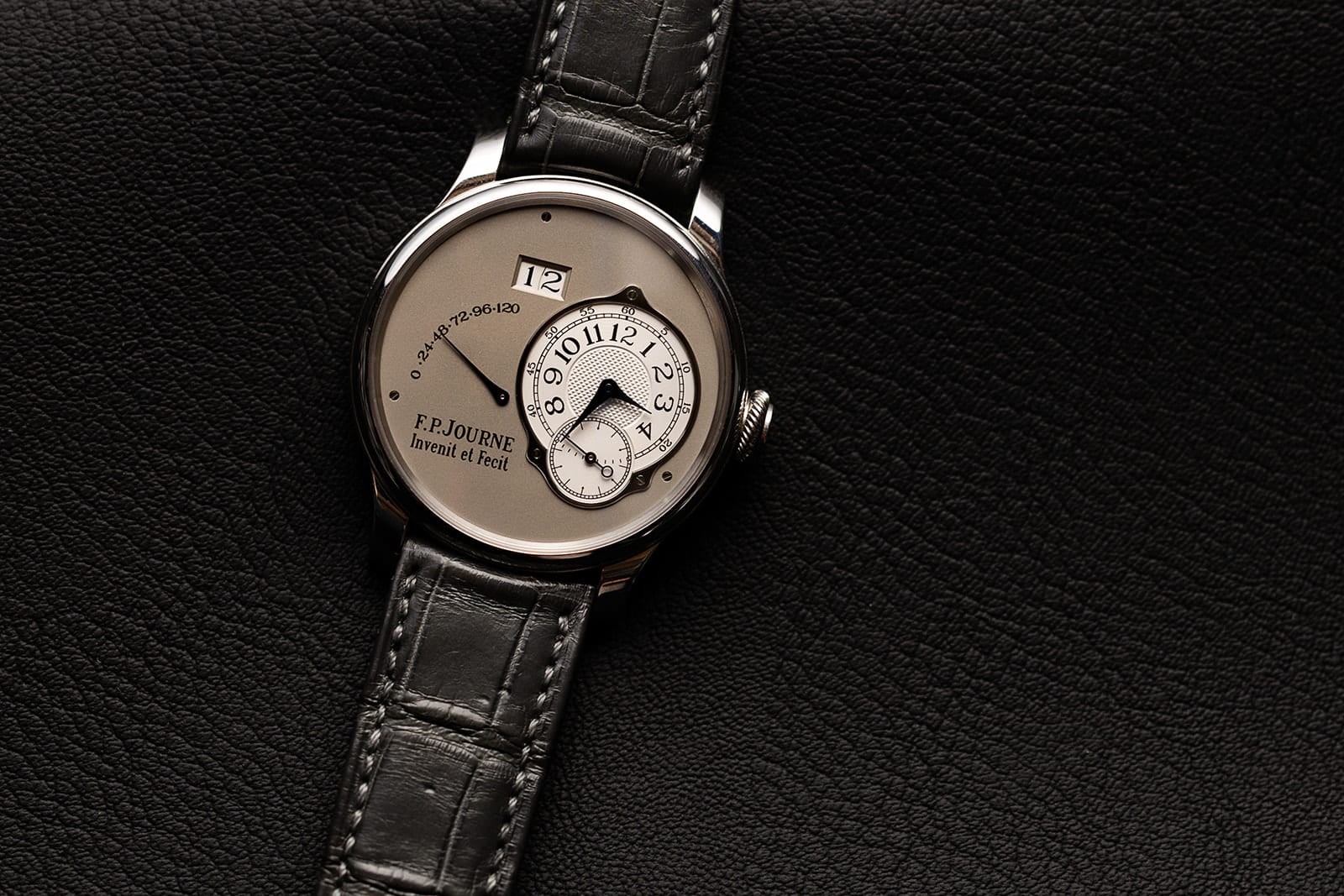 F.P. Journe timepiece photographed on black leather